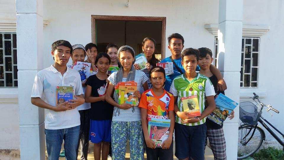 Children with their new school books