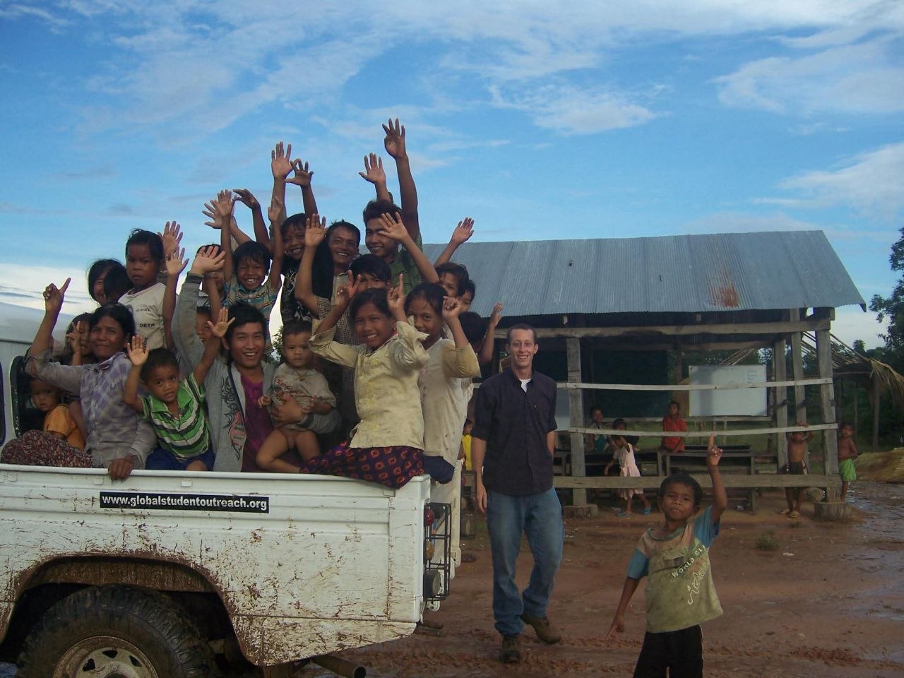 Staff and students meeting to discuss plans for school support via World Food Programme and volunteer fundraising, around 2013